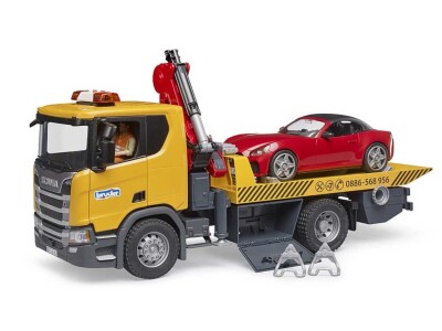 Bruder kamion tegljač Scania Super 560R s autom Roadster i svjetlosnim i zvučnim modulom