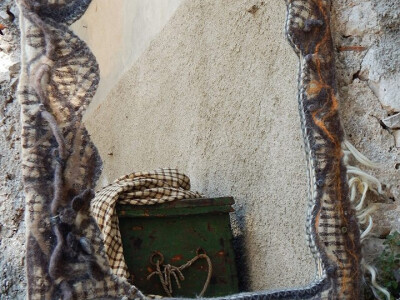 Zrcalo oplemenjeno vunom