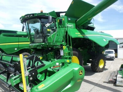 John Deere kombajni