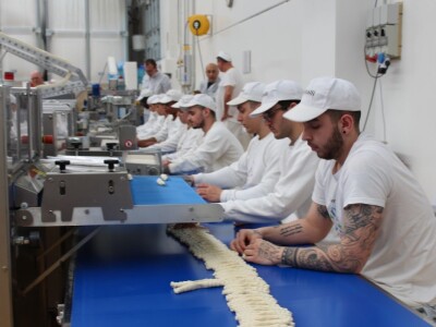 Pekare Vassalli šire kruh iz Ferrare diljem Italije