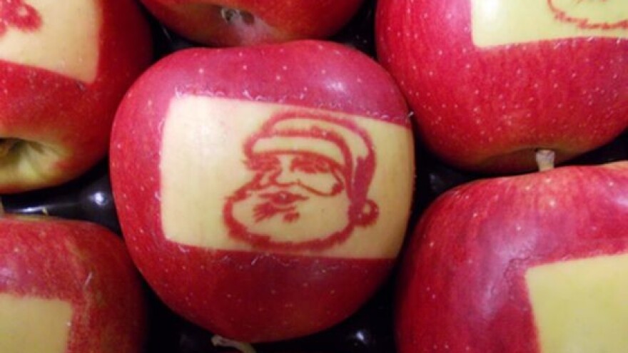 Blagdani uz jabuke s likom Djeda Božićnjaka